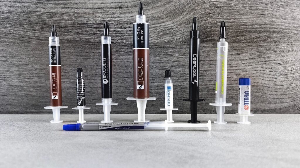 Thermal paste syringes on a workbench
