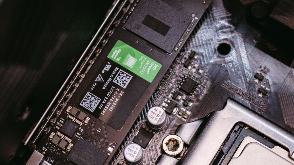 NVMe SSD installed on a motherboard next to the CPU socket