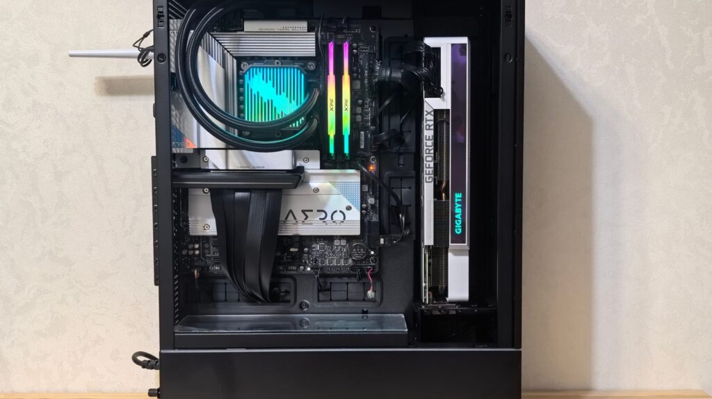 Open PC case on a wooden desk