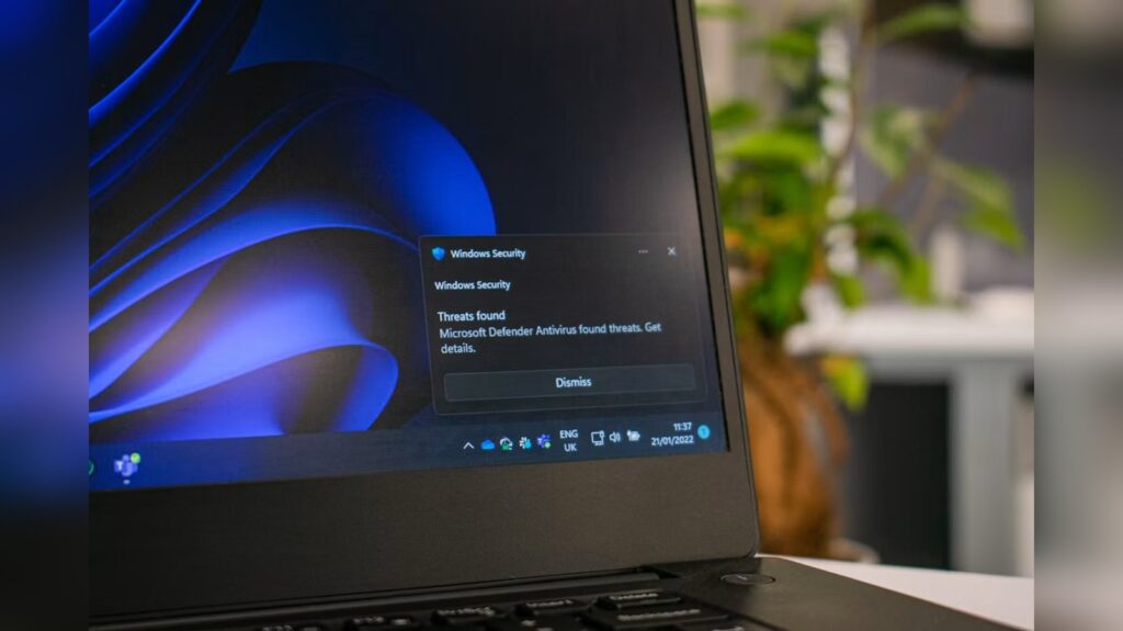 Windows 11 laptop showing a Windows Security notification