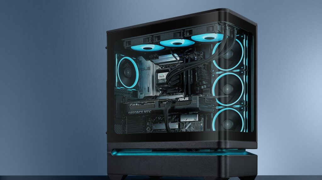 Black prebuilt gaming PC with cyan fans on a studio backdrop